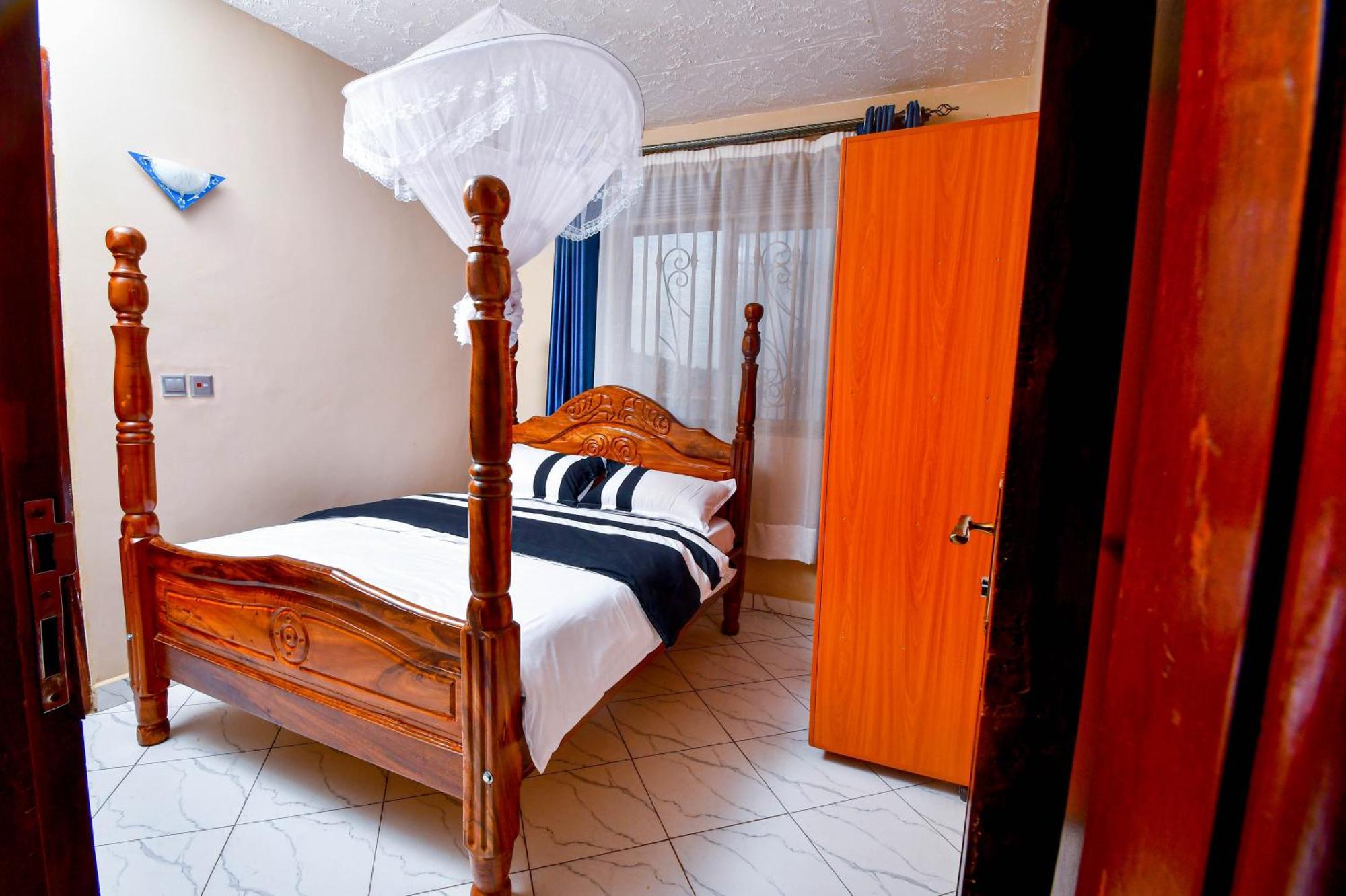 Peace Of Mind Suites Entebbe Exterior photo